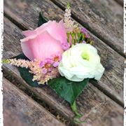 Pale pink rose with Astilbe Ranoncula and Wax 