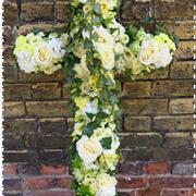 Loose floral white cross