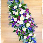 Casket spray white and purple